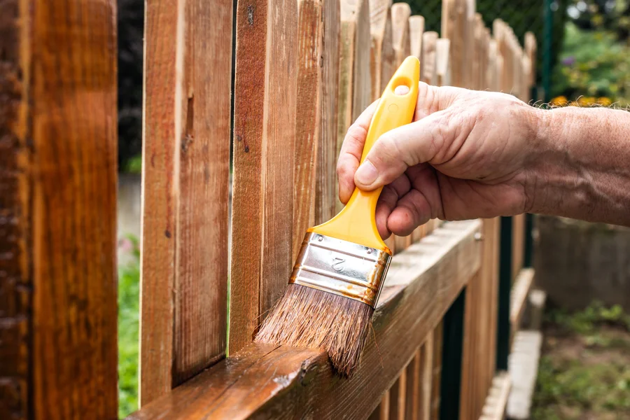 How Fence Staining Protects Wood From Weather Damage Belding, MI
